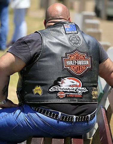 bikie: a motorcyclist who is a member of a club; a biker