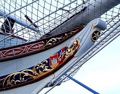 billethead: a carved wooden decoration, usually at the bow of a vessel, generally smaller than a figurehead