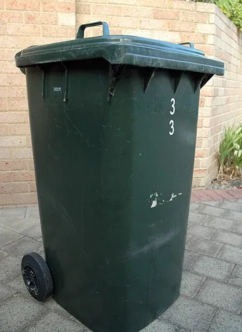 bin: a box, frame, crib, or enclosed place, used as a storage container