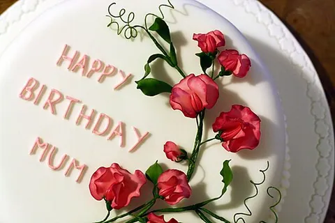 birthday cake: a cake, often iced and decorated, made to celebrate a person's birthday