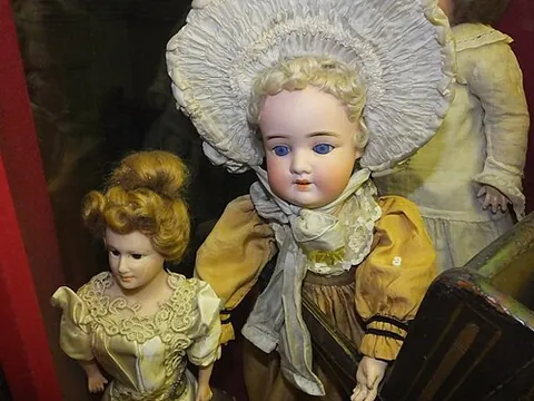 bisque doll: a doll made partially or wholly out of bisque porcelain
