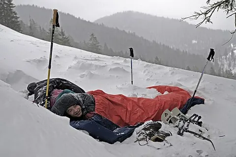 bivvybag: a lightweight, durable, waterproof bag, somewhat larger than a sleeping bag, that acts as an...