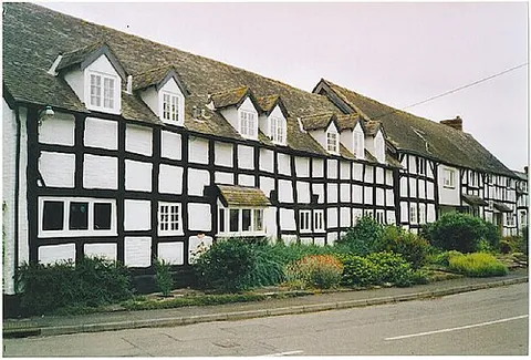 black and white village: any of several old English villages characterised by timbered and half-timbered houses with black...