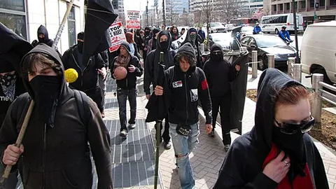 black bloc: any group of individuals who join a protest or demonstration, wearing black clothing including...
