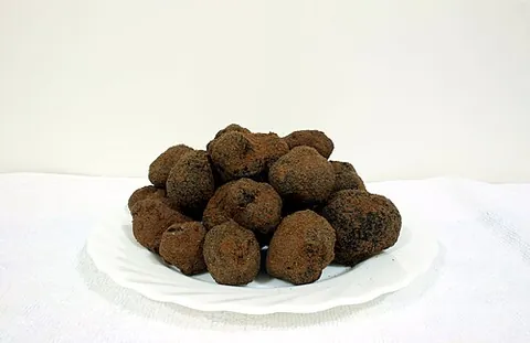 black truffle: a species of truffle, Tuber melanosporum, darker than the white truffle, most commonly from France...