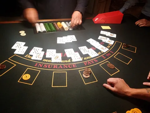 blackjack: a common gambling card game in casinos, where the object is to get as close to 21 without going over