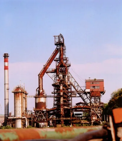 blast furnace: an industrial furnace in which ore is smelted to metal, the process being intensified by a blast of...