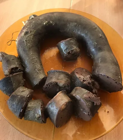 blood sausage: a cooked sausage made out of meat (most often pork), blood and various other regional ingredients