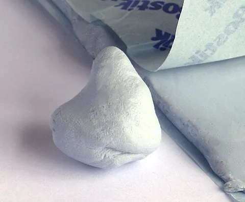 blu-tack: a solid putty-like adhesive, originally blue in colour, used to secure items to walls and other...