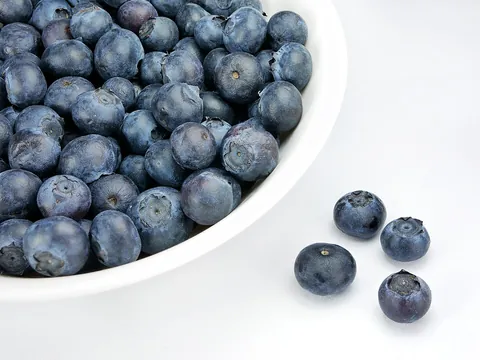 blueberry: an edible round berry, belonging to the cowberry group (Vaccinium sect. Cyanococcus), with flared...