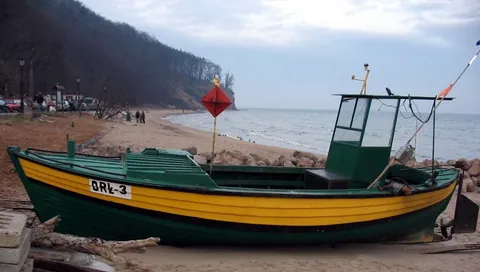boat: vessel for travelling by water