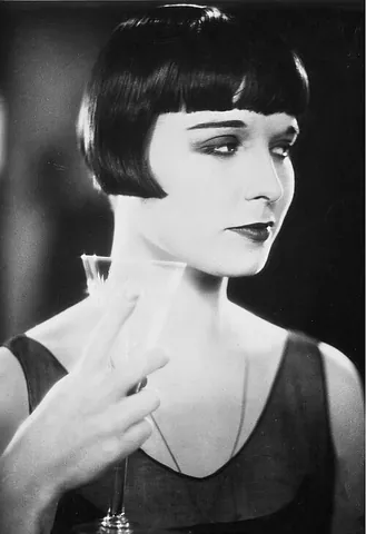 bob haircut: a women's haircut in which both the bangs and back are cut in a straight line, with the back...