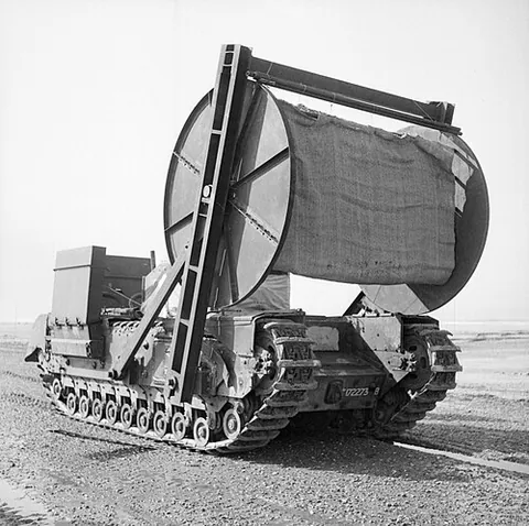 bobbin tank: a road-laying armoured tracked fighting vehicle that carries a spool of fabric to be used as a road...