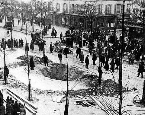 bomb crater: a hole in the ground created by the explosion of a large bomb, usually one dropped by a bomber...