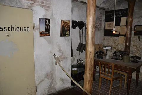 bomb shelter: an air-raid shelter, a structure designed to give protection against bombs