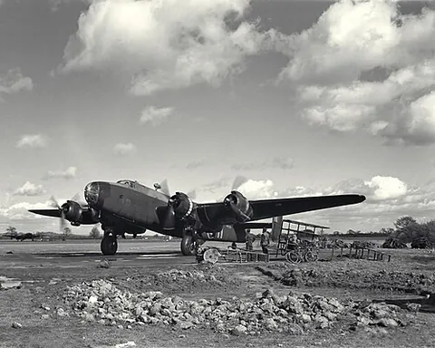 bomber: a military aircraft designed to carry and drop bombs