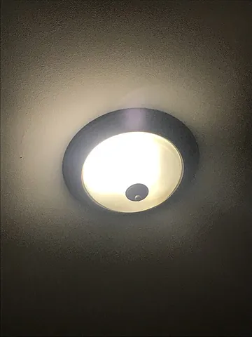 boob light: a dome-shaped ceiling-mounted light fixture, usually with a thumbscrew in the center to remove the...