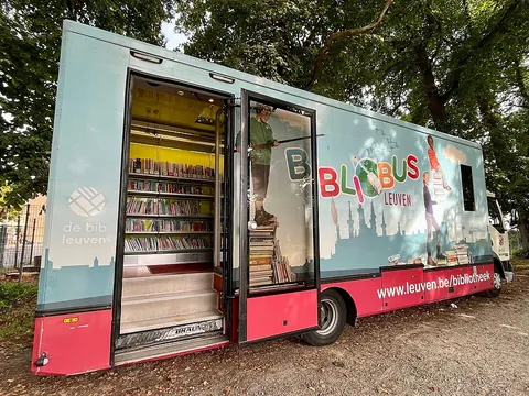 bookmobile: a mobile library; especially, a large van designed to transport a portion of some library's...