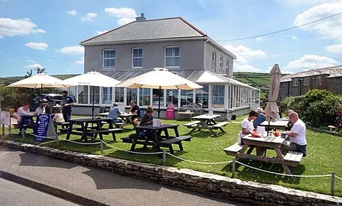 bossiney: a village in Tintagel parish, north Cornwall, England (OS grid ref SX0688)