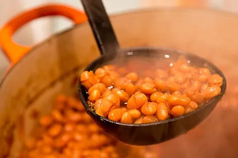 boston baked beans: a variety of baked beans, sweetened with molasses, and flavored with salt pork or bacon