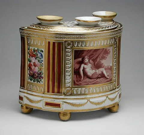 bough pot: a vessel for holding stems of flowers and branches to decorate an indoor space