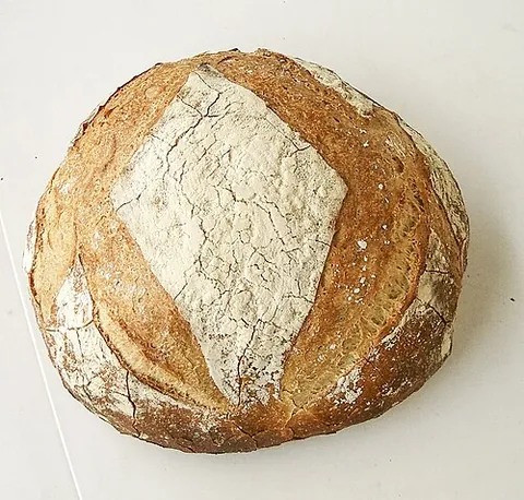 boule: one of the bowls used in the French game of boules