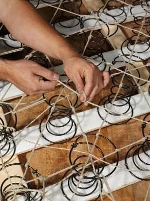box spring: a box-shaped frame into which is a set of spiral springs, upon which rests a bed mattress
