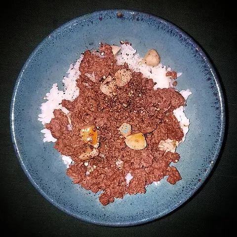 boy kibble: a high-protein dish consisting of rice and ground beef and often vegetables
