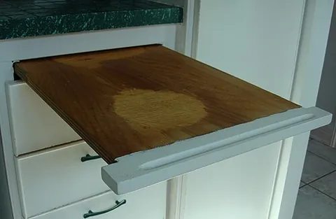 breadboard: a cutting board, especially for cutting bread