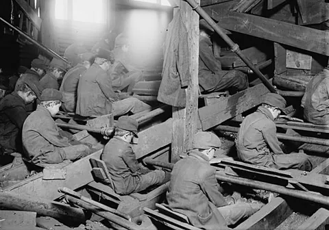 breaker boy: a boy, or sometimes a man unable to do other mining work, employed to separate impurities from coal...