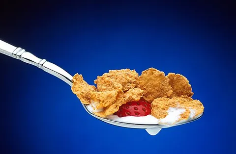breakfast cereal: a food made from processed grains, such as maize, oats, wheat or rice, usually eaten for breakfast...