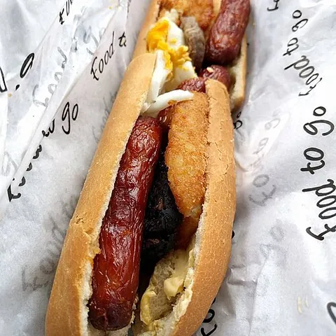 breakfast roll: a bread roll filled with elements of a traditional fry up