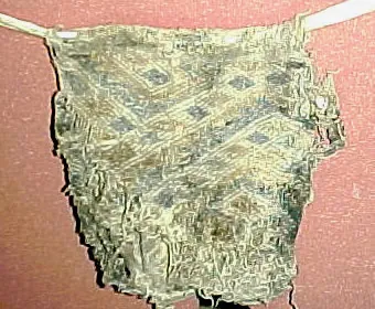 breechcloth: an apron-like garment held on by a belt tied around the waist to cover the loins; a loincloth