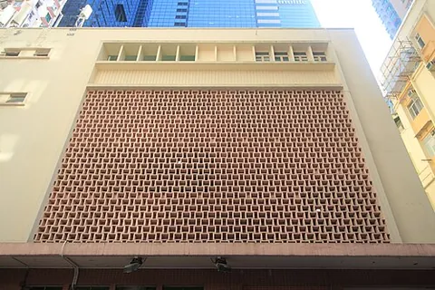 breeze-block: a lightweight building block made from cinders and concrete