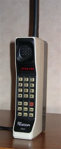 brick phone: a cellular telephone with proportions and weight similar to a brick