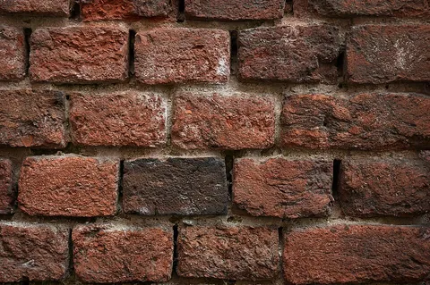 brickwork: a structure, or portion of a structure, that is made out of bricks