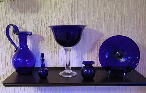 bristol blue glass: a form of decorative glass made in Bristol, England, since the 18th century, and coloured deep blue...