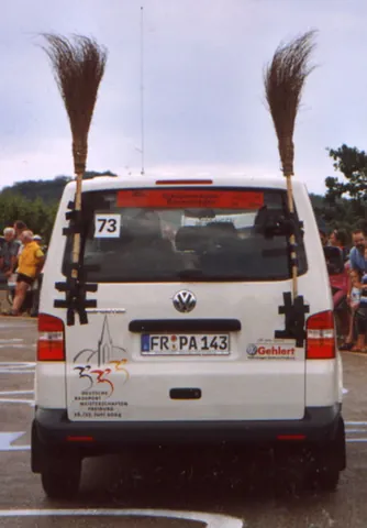 broom wagon: a vehicle that follows a cycling race, picking up stragglers and carrying food and equipment