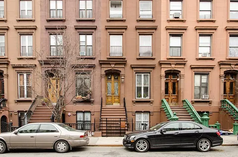 brownstone: a variety of brown to red-brown sandstone once popular as a building material