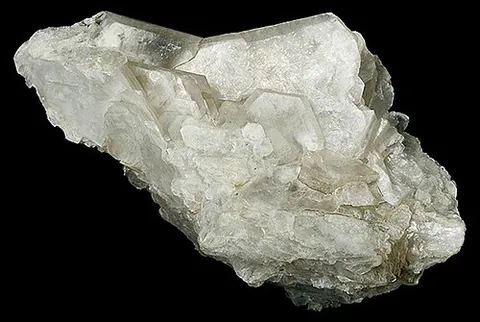brucite: a mineral form of magnesium hydroxide, Mg(OH)₂, often found in thin foliated plates, but may be...