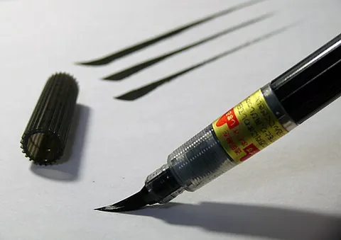 brush pen: a writing and drawing instrument that has a tip like a paintbrush, typically with an ink cartridge...