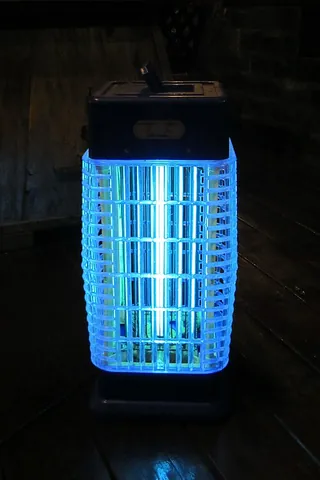 bug zapper: an electrical-discharge insect-control device that attracts flying insects with ultraviolet light...