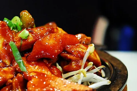 buldak: a heavily spiced Korean dish of barbecued chicken