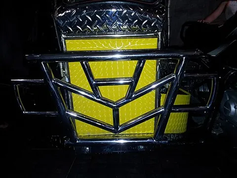 bull bar: a welded framework of metal bars at a vehicle's front, designed to protect it during collisions...