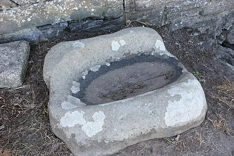 bullaun: a natural depression in a stone, often filled with water and sometimes pebbles