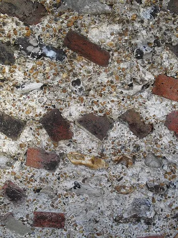 bungaroosh: a building material composed of miscellaneous materials, such as broken bricks, cobblestones,...