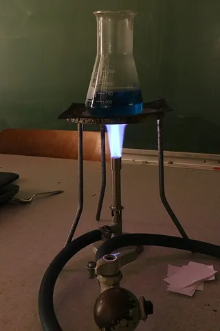 bunsen burner: a small laboratory gas burner whose air supply may be controlled with an adjustable hole