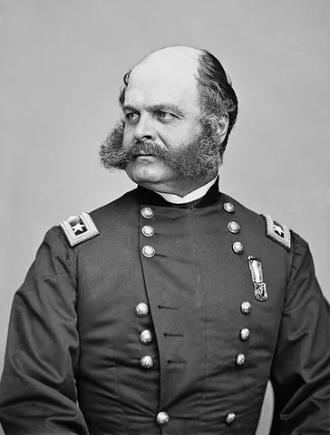 burnside: a moustache, with whiskers on the cheeks but no beard on the chin