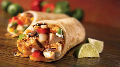 burrito: a Mexican dish consisting of a flour tortilla wrapped around a filling of meat and/or beans, cheese...