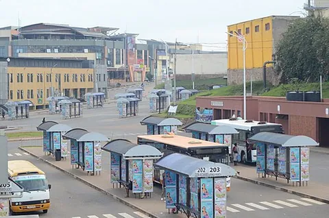 bus station: a major bus stop, one that serves as a transfer point between a large number of routes